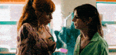 two women are standing next to each other and the words haynah & discord are on the bottom