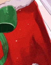 a girl with long white hair is wearing a red dress with a green bow and a bell