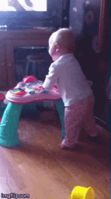 Startled Baby Scared GIF - Startled Baby Scared Fell Down GIFs