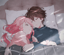 a boy and a girl are sleeping in bed together