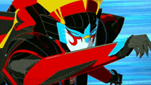 a cartoon character with a red and black costume is holding a red object in his hand