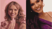 a woman in a pink dress and a woman in a purple dress are smiling and waving at the camera .