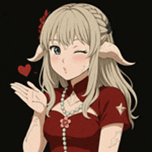 a girl in a red dress is blowing a kiss .
