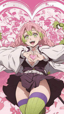 Smiles And Makes A Heart With Her Finger GIF