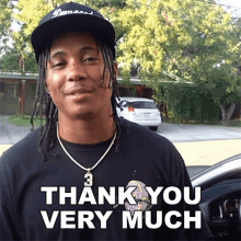 a man wearing a hat and a shirt that says " thank you very much "