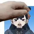 a hand is holding a cartoon character 's head .