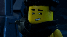 a yellow lego figure with a black scarf around his neck is making a funny face