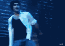 a blurry picture of a man dancing with the words rbd.gif written on the bottom