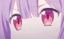 a close up of a girl 's eyes with a purple hair