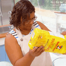Pouring The Ingredient Candice Riley GIF - Pouring The Ingredient Candice Riley The Great Canadian Baking Show GIFs