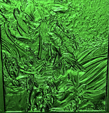 a close up of a green painting on a green background