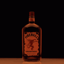a glass filled with liquid is on fire and looks like a flower