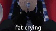 a man is laying on a bed with his hands over his face and crying .