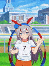 a girl wearing a white shirt with the number seven on it