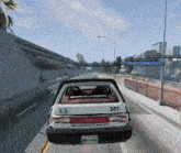 a belanco city police car is driving down a street
