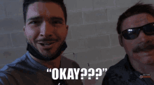 a man wearing a mask says " okay " next to another man