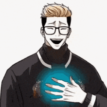 a man wearing glasses and a black sweater is holding a blue ball in his hands .