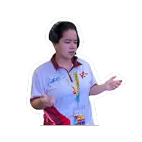 a woman wearing headphones and a lanyard with the word committee on it