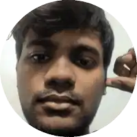a close up of a man covering his ear with his finger