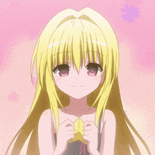a girl with blonde hair and pink eyes is holding a star
