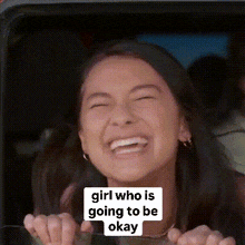 a woman is laughing while sitting in a car with a caption that says `` girl who is going to be okay ''