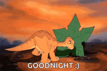 a cartoon dinosaur is standing next to a maple leaf and says `` goodnight '' .