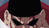 a close up of a man 's face with blood coming out of it