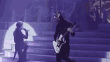 Ghoul Masked GIF - Ghoul Masked Playing The Guitar GIFs