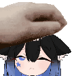 a hand is putting a piece of bread on top of a girl 's head .