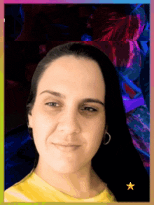 a woman in a yellow shirt with a yellow star on the bottom right