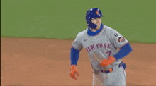 a baseball player wearing a new york jersey