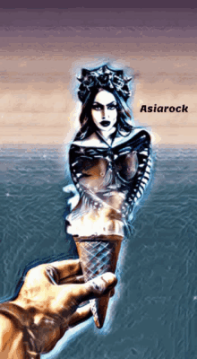 a hand holding an ice cream cone with a picture of a woman on it and the words asiarock below it