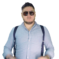 a man wearing suspenders and sunglasses is making a gesture