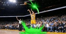 a basketball player wearing a yellow jersey with the number 30 on it