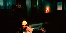 a man and woman are kissing in the dark