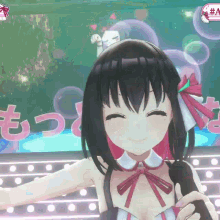 a girl with black hair is smiling and holding a microphone in front of a sign that says #a