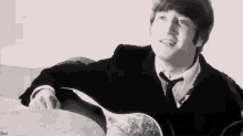 John Lennon Listening GIF - John Lennon Listening The Beatles GIFs