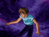 a boy in a blue shirt and black pants is standing in a dark room .