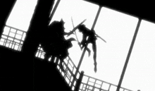 a silhouette of two people fighting with swords in front of a window