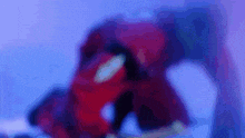 a blurry picture of a person in a red suit in a purple room .