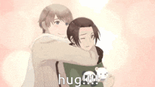 a couple of anime characters hugging each other with the word hug written on the bottom .