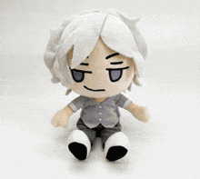 a stuffed toy with a sword in his hand