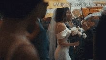 a bride and groom are walking in the rain under umbrellas with a big bold beautiful journey written below them