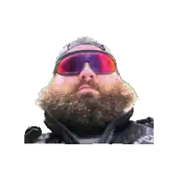 a man with a beard wearing goggles and a hat