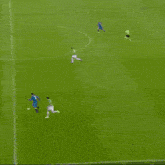 a soccer game is being played in front of a banner that says balocco