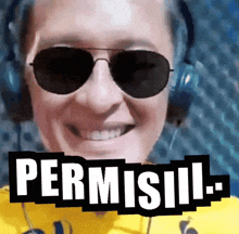a man wearing sunglasses and headphones has the word permisil on the bottom