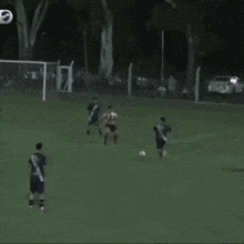 a group of soccer players are playing on a field with a soccer ball in the background that says ' uruguay '