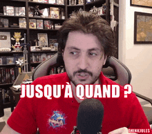 a man in a red shirt says jusqu 'a quand
