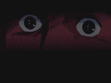a close up of a person 's eyes with the letter c in the middle