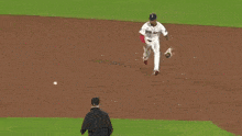 a baseball player with the number 12 on the back of his shirt